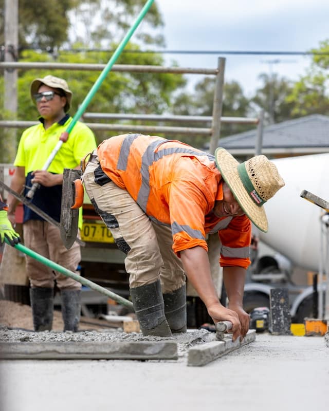 a guy working on slab foundation